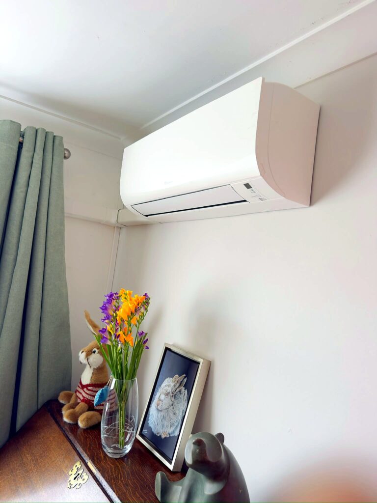 Daikin wall-mounted air conditioner in a bedroom – air conditioning Dorking